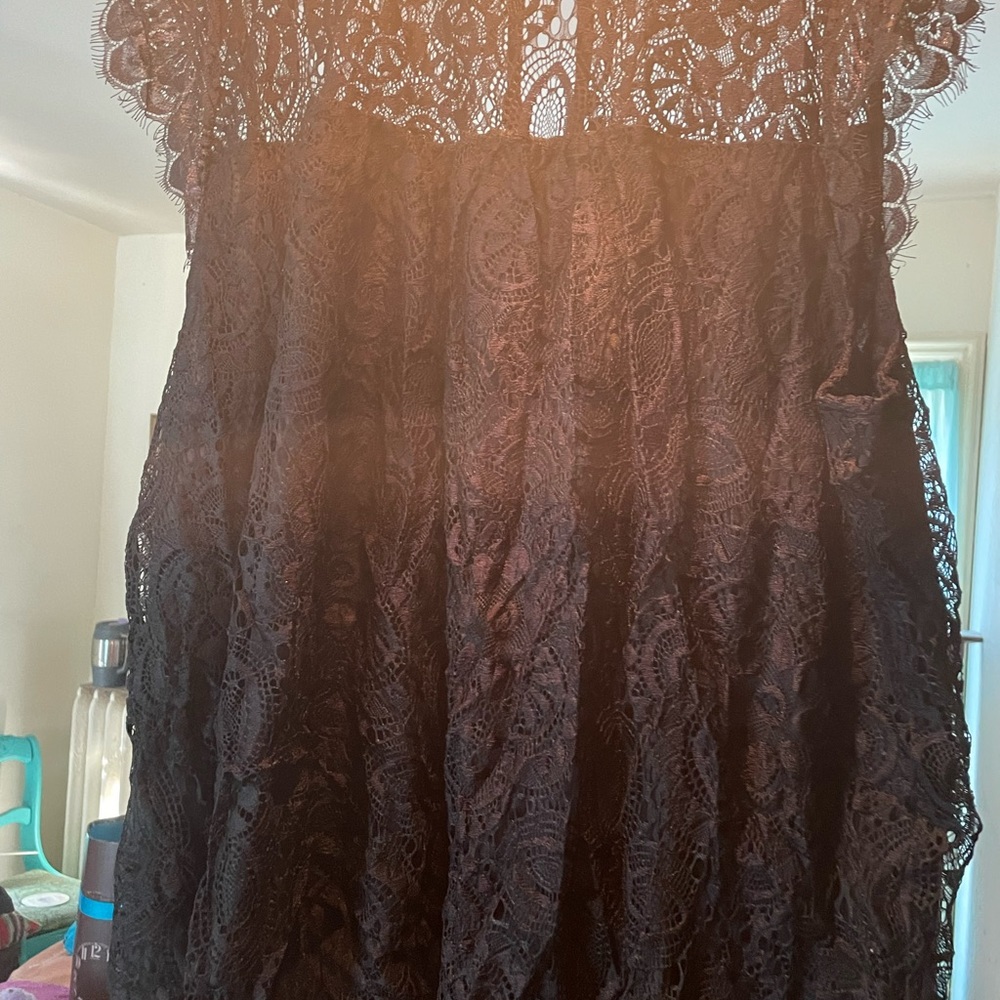 Sleeveless lace blouse